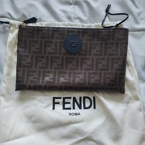 SOLD****Fendi Small FF clutch. Brand new